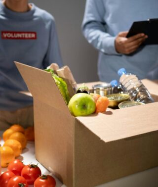 Team members volunteering at a food bank