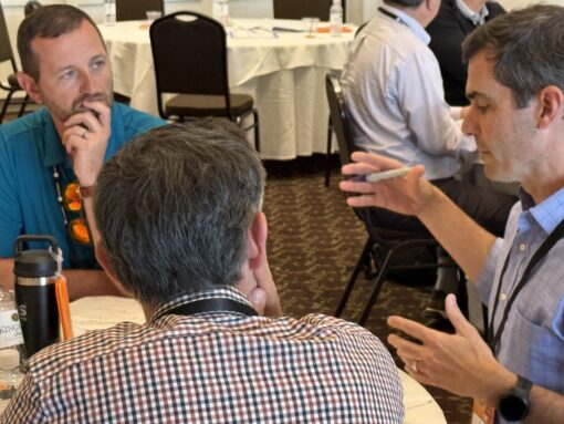 Group talking at VACEOs event
