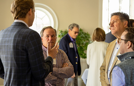 Group of leaders talking at VACEOs event