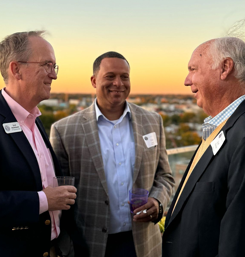 Group of leaders chatting at VACEOs event